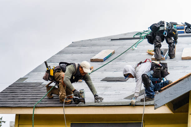 Professional Gutter Installation technician working in Oxford, PA